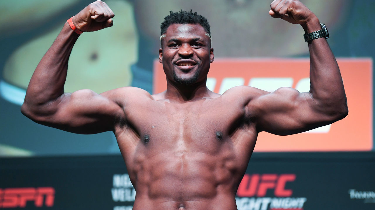 PHOENIX, ARIZONA - FEBRUARY 16: Francis Ngannou of Cameroon poses on the scale during the UFC Fight Night weigh-in at Comerica Theatre on February 16, 2019 in the Phoenix, Arizona.