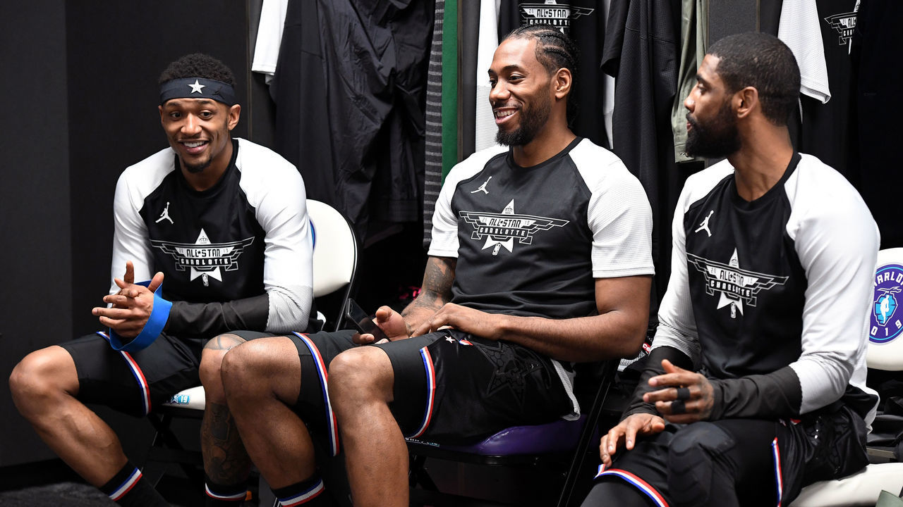 CHARLOTTE, NC - FEBRUARY 17: Bradley Beal #3 Kawhi Leonard #2, and Kyrie Irving #11 of Team LeBron talk before the 2019 NBA All-Star Game on February 17, 2019 at the Spectrum Center in Charlotte, North Carolina. NOTE TO USER: User expressly acknowledges and agrees that, by downloading and/or using this photograph, user is consenting to the terms and conditions of the Getty Images License Agreement. Mandatory Copyright Notice: Copyright 2019 NBAE