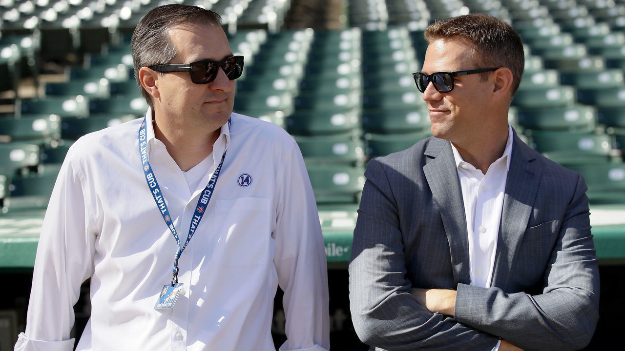 CHICAGO, IL - OCTOBER 09: Chicago Cubs owner Tom Ricketts (L) and general manager Theo Esptein look on before game three of the National League Division Series against the Washington Nationals at Wrigley Field on October 9, 2017 in Chicago, Illinois.