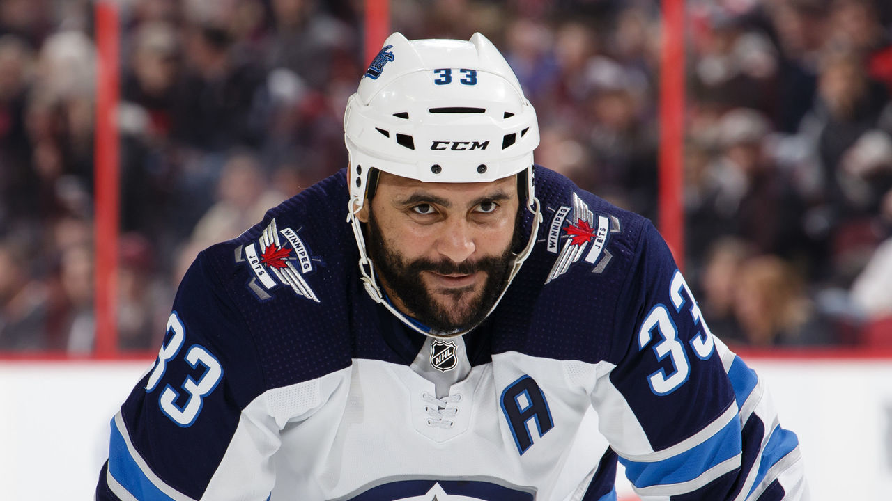 OTTAWA, ON - FEBRUARY 9: Dustin Byfuglien #33 of the Winnipeg Jets looks on during a face-off against the Ottawa Senators at Canadian Tire Centre on February 9, 2019 in Ottawa, Ontario, Canada.