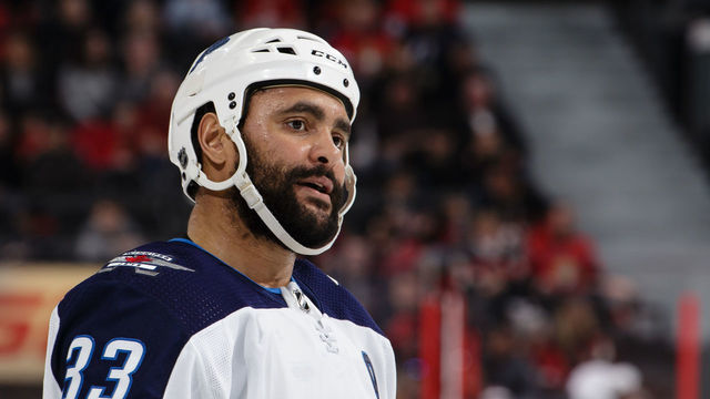 OTTAWA, ON - FEBRUARY 9: Dustin Byfuglien #33 of the Winnipeg Jets looks on in a game against the Ottawa Senators at Canadian Tire Centre on February 9, 2019 in Ottawa, Ontario, Canada.