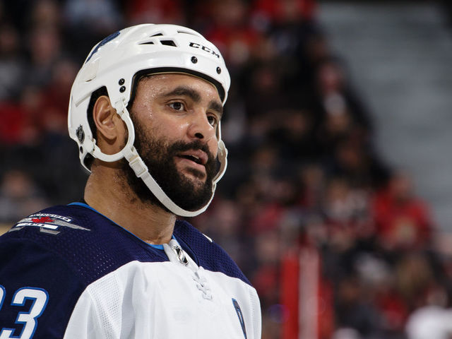 OTTAWA, ON - FEBRUARY 9: Dustin Byfuglien #33 of the Winnipeg Jets looks on in a game against the Ottawa Senators at Canadian Tire Centre on February 9, 2019 in Ottawa, Ontario, Canada.