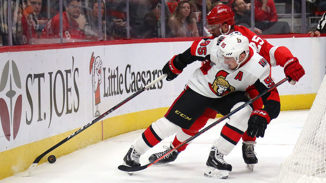 DETROIT, MICHIGAN - FEBRUARY 14: Matt Duchene #95 of the Ottawa Senators battles for the puck against Mike Green #25 of the Detroit Red Wings during the first period at Little Caesars Arena on February 14, 2019 in Detroit, Michigan.