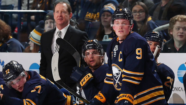 BUFFALO, NY - FEBRUARY 5: Head coach Phil Housley, Casey Mittelstadt #37, Conor Sheary #43 and Jack Eichel #9 of the Buffalo Sabres watch the action during an NHL game against the Minnesota Wild on February 5, 2019 at KeyBank Center in Buffalo, New York.