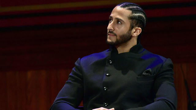 CAMBRIDGE, MA - OCTOBER 11: Colin Kaepernick on stage at the W.E.B. Du Bois Medal Award Ceremony at Harvard University on October 11, 2018 in Cambridge, Massachusetts. 2018 Honorees included Kehinde Wiley, Florence Ladd, Kenneth Chenault, Shirley Ann Jackson, Pamela Joyner, Bryan Stevenson, Dave Chappelle and Colin Kaepernick.