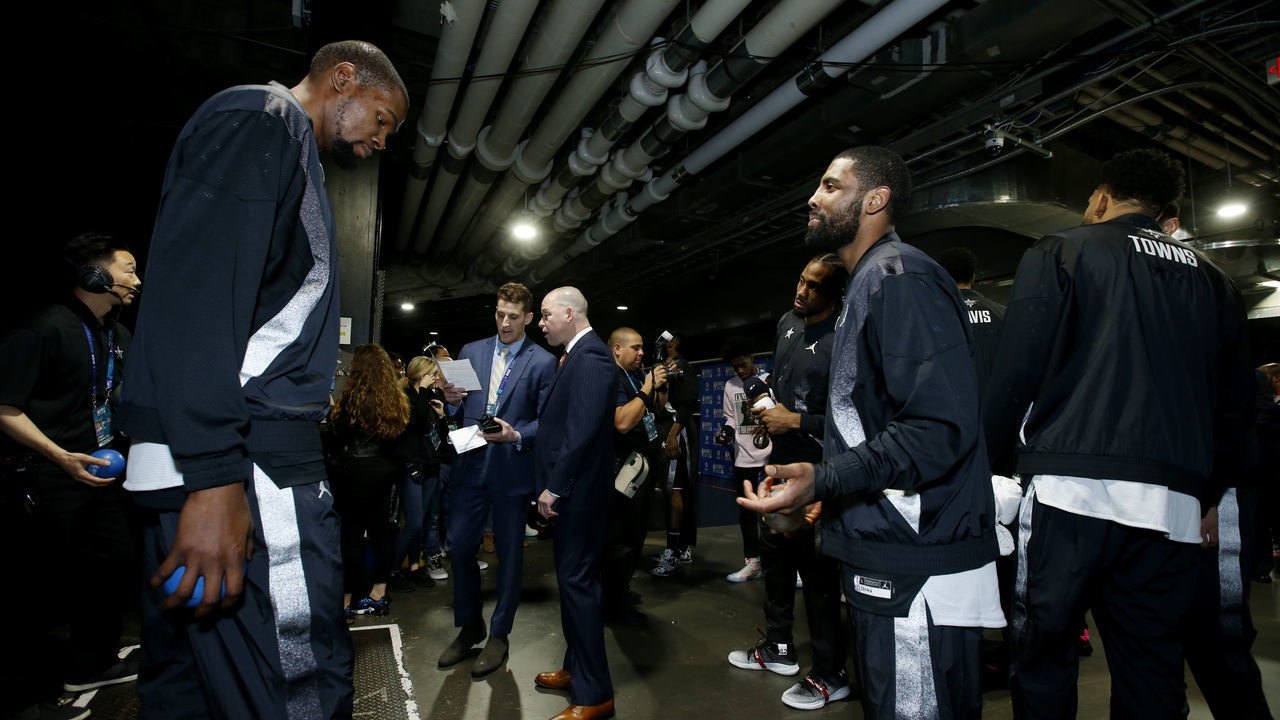 CHARLOTTE, NC - FEBRUARY 17: Kevin Durant #35 and Kyrie Irving #11 of Team LeBron are seen during the 2019 NBA All-Star Game on February 17, 2019 at the Spectrum Center in Charlotte, North Carolina. NOTE TO USER: User expressly acknowledges and agrees that, by downloading and/or using this photograph, user is consenting to the terms and conditions of the Getty Images License Agreement. Mandatory Copyright Notice: Copyright 2019 NBAE