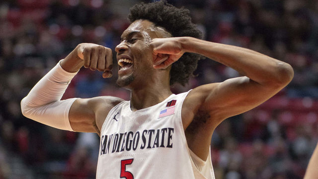 SAN DIEGO, CA - FEBRUARY 09: San Diego State University Aztecs forward Jalen McDaniels (5) flexes during the game between the Utah State Aggies and the San Diego State University Aztecs on February 09, 2019 at the Steve Fisher Court at Viejas Arena in San Diego, California.