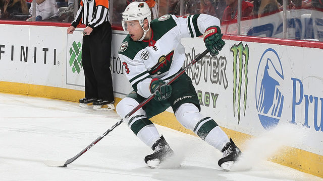 NEWARK, NJ - FEBRUARY 09: Charlie Coyle #3 of the Minnesota Wild plays the puck during the game against the New Jersey Devils at Prudential Center on February 9, 2019 in Newark, New Jersey.