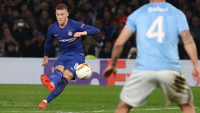 Chelsea's English midfielder Ross Barkley scores their second goal from this freekick during the UEFA Europa League round of 32, 2nd leg football match between Chelsea and Malmo at Stamford Bridge in London on February 21, 2019.