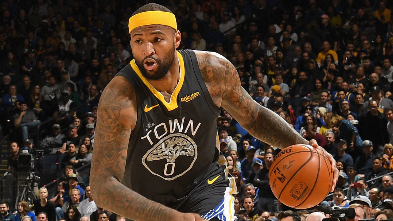 OAKLAND, CA - FEBRUARY 12: DeMarcus Cousins #0 of the Golden State Warriors handles the ball against the Utah Jazz on February 12, 2019 at ORACLE Arena in Oakland, California. NOTE TO USER: User expressly acknowledges and agrees that, by downloading and/or using this photograph, user is consenting to the terms and conditions of Getty Images License Agreement. Mandatory Copyright Notice: Copyright 2019 NBAE