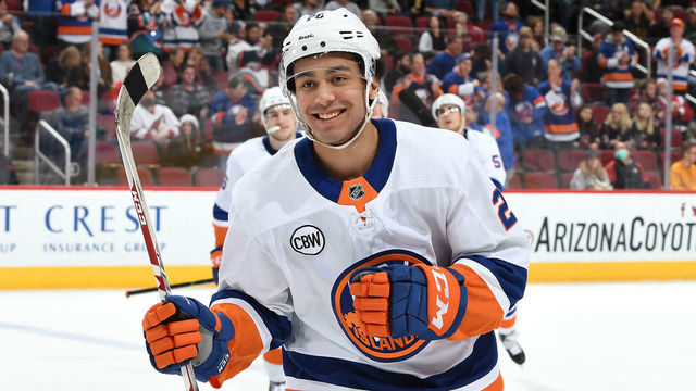 GLENDALE, AZ - DECEMBER 18: Joshua Ho-Sang #26 of the New York Islanders skates back to the bench after scoring a goal against the Arizona Coyotes during the first period at Gila River Arena on December 18, 2018 in Glendale, Arizona.