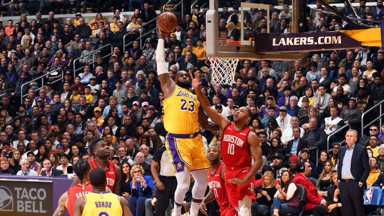 LOS ANGELES, CA - FEBRUARY 21: LeBron James #23 of the Los Angeles Lakers dunks the ball against the Houston Rockets on February 21, 2019 at STAPLES Center in Los Angeles, California. NOTE TO USER: User expressly acknowledges and agrees that, by downloading and/or using this Photograph, user is consenting to the terms and conditions of the Getty Images License Agreement. Mandatory Copyright Notice: Copyright 2019 NBAE