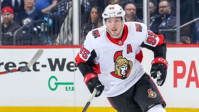 WINNIPEG, MB - FEBRUARY 16: Matt Duchene #95 of the Ottawa Senators plays the puck down the ice during first period action against the Winnipeg Jets at the Bell MTS Place on February 16, 2019 in Winnipeg, Manitoba, Canada. The Sens defeated the Jets 4-3 in overtime.