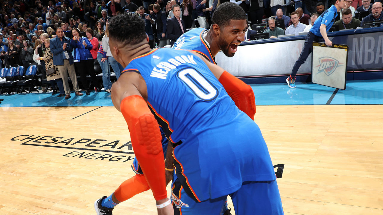 OKLAHOMA CITY, OK- FEBRUARY 22: Russell Westbrook #0 and Paul George #13 of the Oklahoma City Thunder celebrate after a game against the Utah Jazz on February 22, 2019 at Chesapeake Energy Arena in Oklahoma City, Oklahoma. Mandatory Copyright Notice: Copyright 2019 NBAE