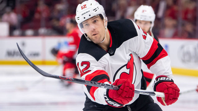 CHICAGO, IL - FEBRUARY 14: New Jersey Devils defenseman Ben Lovejoy (12) warms up prior to a game against the Chicago Blackhawks on February 14, 2019, at the United Center in Chicago, IL.