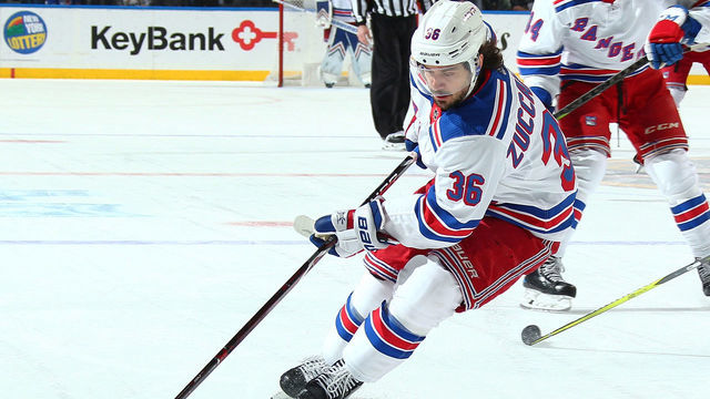 BUFFALO, NY - FEBRUARY 15: Mats Zuccarello #36 of the New York Rangers controls the puck during an NHL game against the Buffalo Sabres on February 15, 2019 at KeyBank Center in Buffalo, New York.