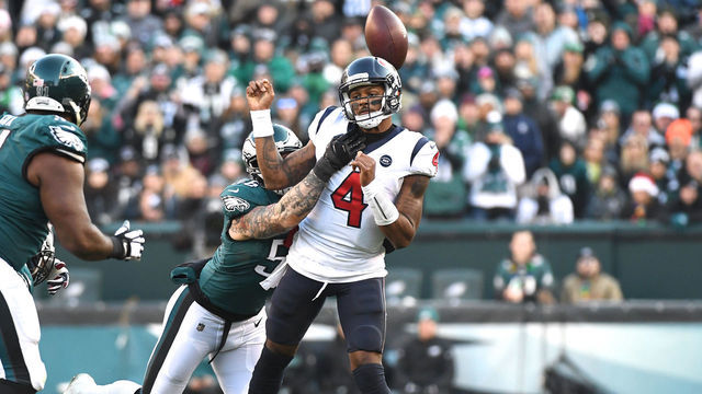 PHILADELPHIA, PA - DECEMBER 23: Philadelphia Eagles Defensive End Chris Long (56) sacks Houston Texans Quarterback Deshaun Watson (4) during the game between the Houston Texans and the Philadelphia Eagles on December 23, 2018, at Lincoln Financial Field in Philadelphia,PA.
