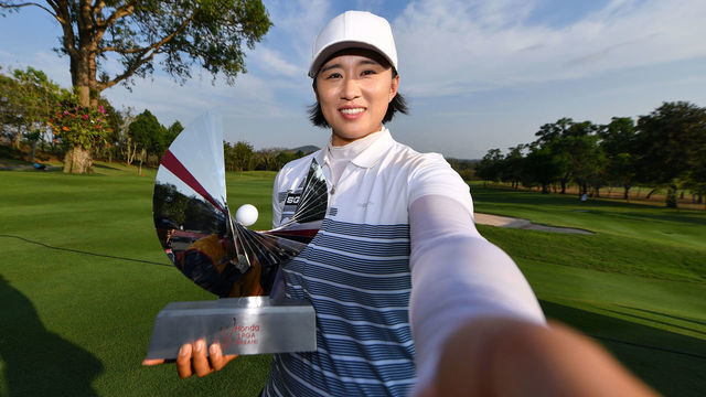 CHONBURI, THAILAND - FEBRUARY 24: Amy Yang of Republic of Korea imitates taking a selfie photo with her trophy after winning the Honda LPGA Thailand at the Siam Country Club Pattaya on February 24, 2019 in Chonburi, Thailand.