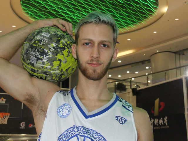 BEIJING, CHINA - AUGUST 20: Canadian dunker Jordan Kilganon attends a freestyle basketball event at Xinao Shopping Center on August 20, 2017 in Beijing, China.