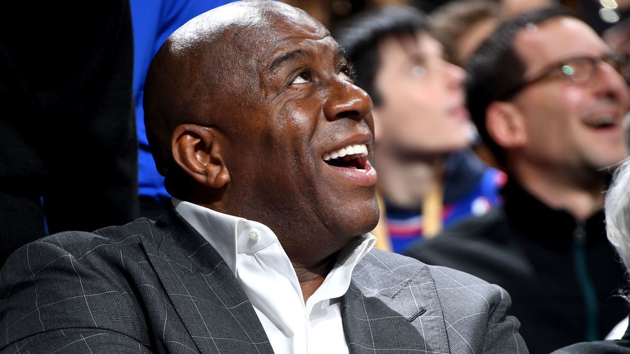 PHILADELPHIA, PA - FEBRUARY 10: Magic Johnson smiles during the game between the Philadelphia 76ers and the Los Angeles Lakers on February 10, 2019 at the Wells Fargo Center in Philadelphia, Pennsylvania NOTE TO USER: User expressly acknowledges and agrees that, by downloading and/or using this Photograph, user is consenting to the terms and conditions of the Getty Images License Agreement. Mandatory Copyright Notice: Copyright 2019 NBAE