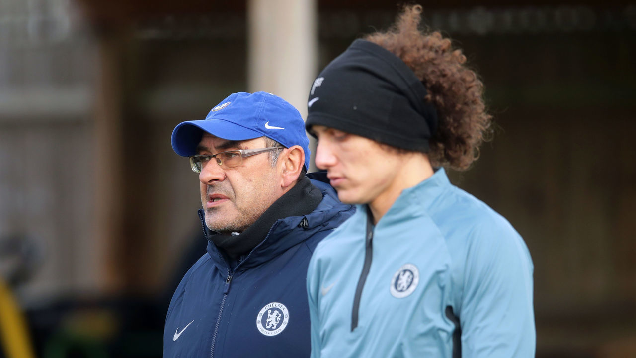 Chelsea manager Maurizio Sarri (left) speaks to David Luiz during the training session at Cobham Training Ground, London.