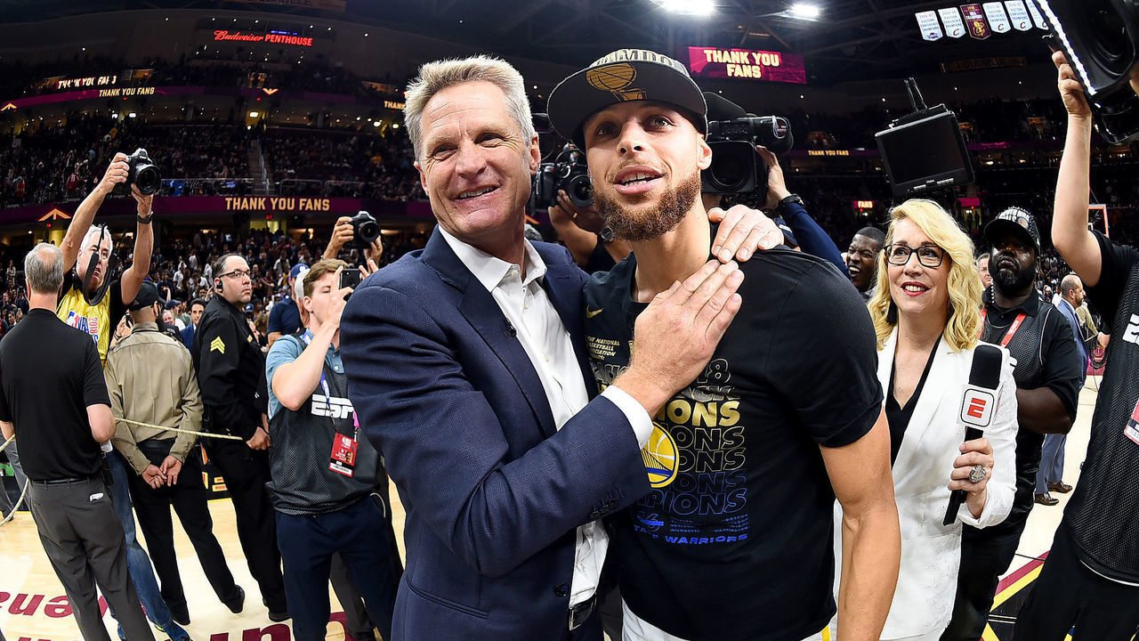 CLEVELAND, OH - JUNE 8: Head Coach Steve Kerr and Stephen Curry #30 of the Golden State Warriors celebrate after Game Four of the 2018 NBA Finals against the Cleveland Cavaliers on June 8, 2018 at Quicken Loans Arena in Cleveland, Ohio. Mandatory Copyright Notice: Copyright 2018 NBAE