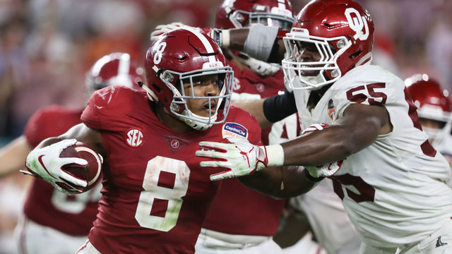 MIAMI, FL - DECEMBER 29: Josh Jacobs #8 of the Alabama Crimson Tide carries the ball against the defense of Kenneth Mann #55 of the Oklahoma Sooners in the fourth quarter during the College Football Playoff Semifinal at the Capital One Orange Bowl against the Oklahoma Sooners at Hard Rock Stadium on December 29, 2018 in Miami, Florida.