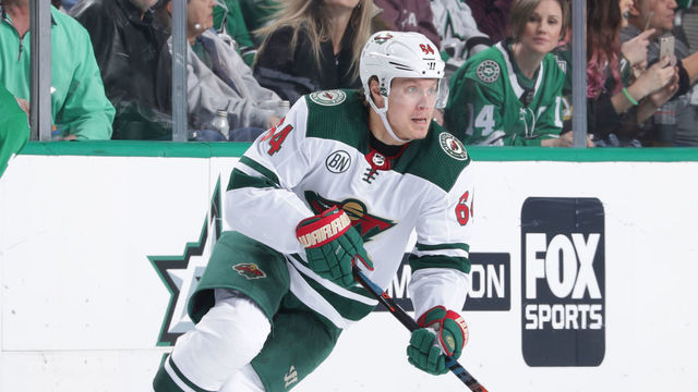 DALLAS, TX - FEBRUARY 1: Mikael Granlund #64 of the Minnesota Wild handles the puck against the Dallas Stars at the American Airlines Center on February 1, 2019 in Dallas, Texas.