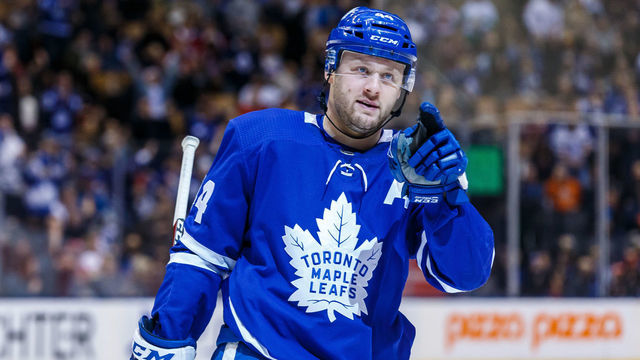 TORONTO, ON - FEBRUARY 23: Morgan Rielly #44 of the Toronto Maple Leafs points at an NHL game against the Montreal Canadiens during the second period at the Scotiabank Arena on February 23, 2019 in Toronto, Ontario, Canada.