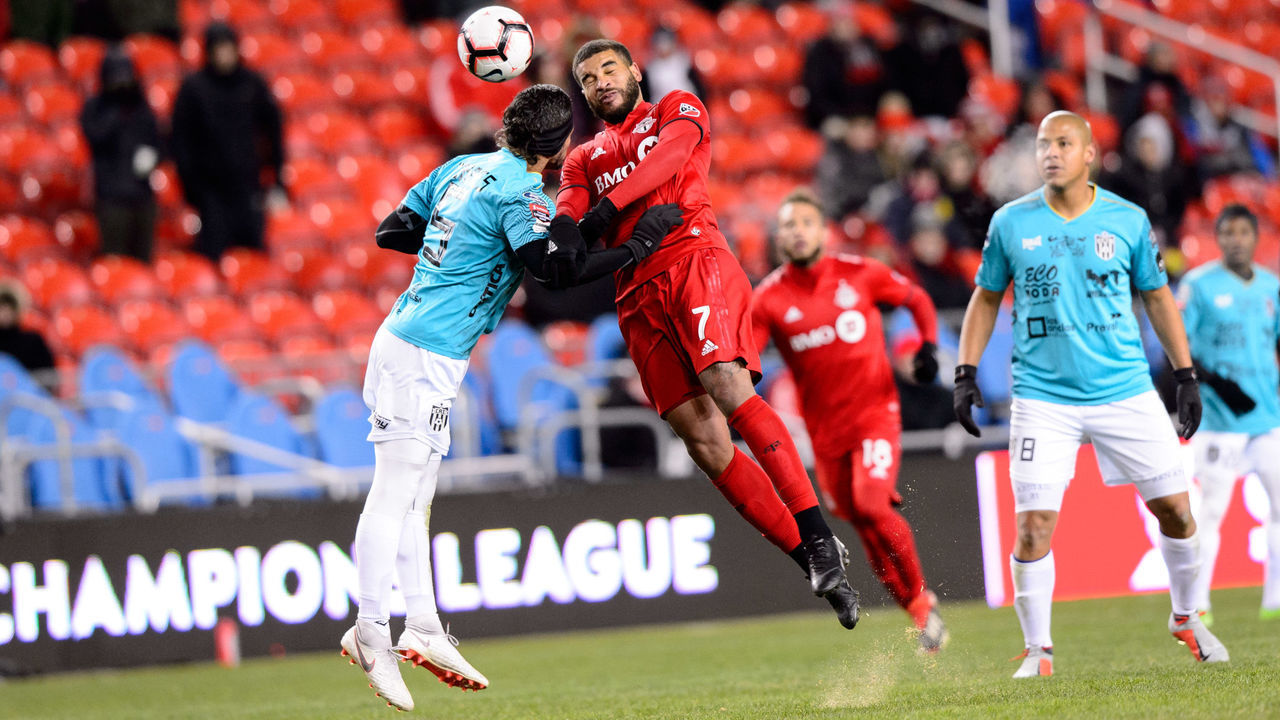 TORONTO, ON - FEBRUARY 26: Manuel Torres (5) of Independiente challenges Jordan Hamilton (7) of Toronto FC during the first half of the CONCACAF Champions League Round of 16 match between Toronto FC and Independiente de la Chorrera on February 26, 2019, at BMO Field in Toronto, ON, Canada.