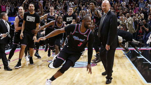 MIAMI, FLORIDA - FEBRUARY 27: Dwyane Wade #3 of the Miami Heat celebrates after hitting a game-winning three pointer against the Golden State Warriors at American Airlines Arena on February 27, 2019 in Miami, Florida.