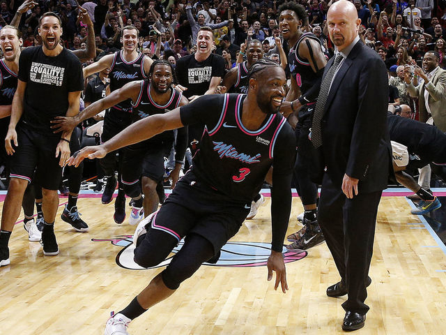 MIAMI, FLORIDA - FEBRUARY 27: Dwyane Wade #3 of the Miami Heat celebrates after hitting a game-winning three pointer against the Golden State Warriors at American Airlines Arena on February 27, 2019 in Miami, Florida.