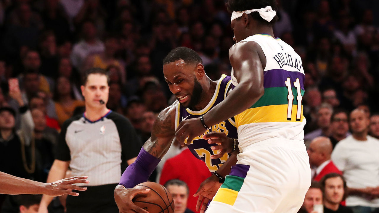 LOS ANGELES, CALIFORNIA - FEBRUARY 27: LeBron James #23 of the Los Angeles Lakers drives against Jrue Holiday #11 of the New Orleans Pelicans during the second half at Staples Center on February 27, 2019 in Los Angeles, California.