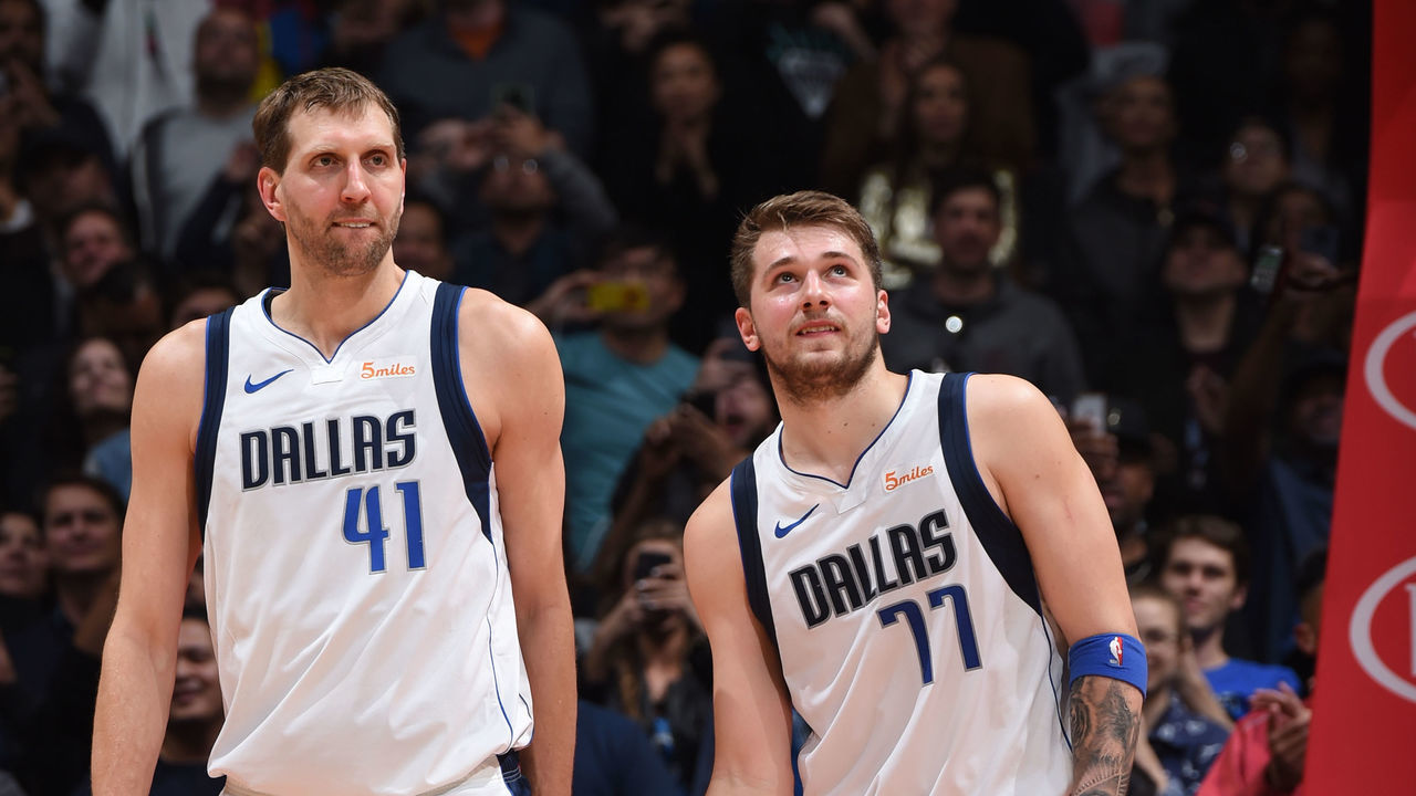 LOS ANGELES, CA - FEBRUARY 25: Dirk Nowitzki #41 and Luka Doncic #77 of the Dallas Mavericks look on during a game against the LA Clippers on February 25, 2019 at STAPLES Center in Los Angeles, California. NOTE TO USER: User expressly acknowledges and agrees that, by downloading and/or using this Photograph, user is consenting to the terms and conditions of the Getty Images License Agreement. Mandatory Copyright Notice: Copyright 2019 NBAE