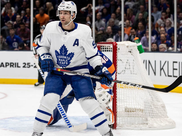 UNIONDALE, NY - FEBRUARY 26: Toronto Maple Leafs Center John Tavares (91) sets up in front of New York Islanders Goalie Robin Lehner (40) during a game between the New York Islanders and the Calgary Flames on February 26, 2019 at the Nassau Veterans Memorial Coliseum in Uniondale, NY.