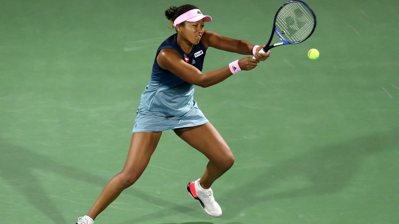 DUBAI, UNITED ARAB EMIRATES - FEBRUARY 19: Naomi Osaka of Japan plays a backhand against Kristina Mladenovic of France during day three of the WTA Dubai Duty Free Tennis Championships at Dubai Tennis Stadium on February 19, 2019 in Dubai, United Arab Emirates.