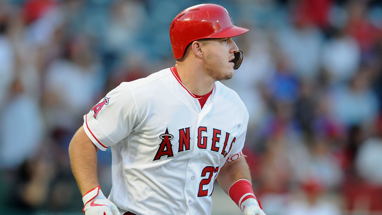 ANAHEIM, CA - SEPTEMBER 15: Los Angeles Angels of Anaheim center fielder Mike Trout (27) hits a two run home run in the first inning of a game against the Seattle Mariners played on September 15, 2018 at Angel Stadium of Anaheim in Anaheim, CA.