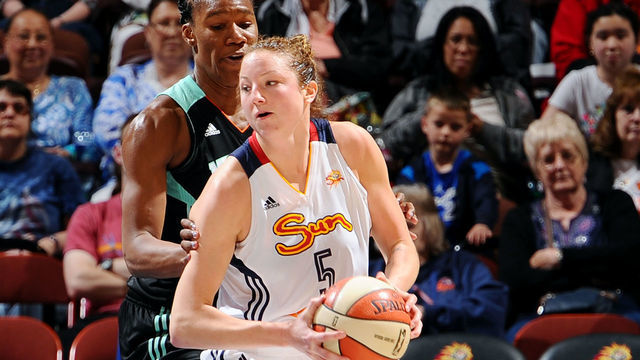 UNCASVILLE, CT - JUNE 15: Kelsey Griffin #5 of the Connecticut Sun handles the ball against the New York Liberty on June 15, 2014 at the Mohegan Sun in Uncasville, Connecticut. Mandatory Copyright Notice: Copyright 2014 NBAE