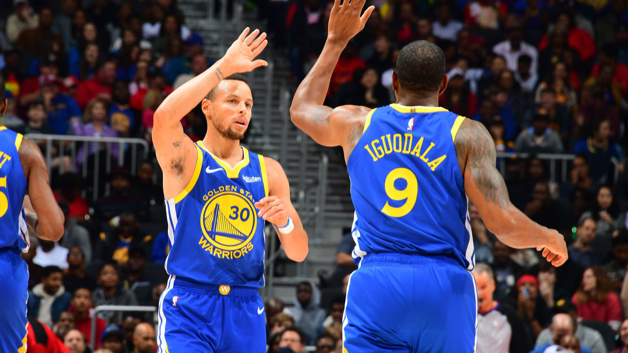 ATLANTA, GA - DECEMBER 3: Stephen Curry #30 and Andre Iguodala #9 of the Golden State Warriors celebrates during the game against the Atlanta Hawks on December 3, 2018 at State Farm Arena in Atlanta, Georgia. NOTE TO USER: User expressly acknowledges and agrees that, by downloading and/or using this Photograph, user is consenting to the terms and conditions of the Getty Images License Agreement. Mandatory Copyright Notice: Copyright 2018 NBAE