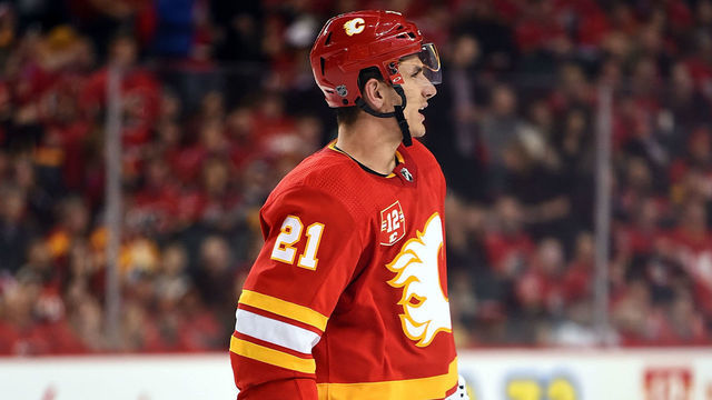 CALGARY, AB - MARCH 02: Calgary Flames Right Wing Garnet Hathaway (21) skates to the bench after being ejected for a match penalty during the second period of an NHL game where the Calgary Flames hosted the Minnesota Wild on March 2, 2019, at the Scotiabank Saddledome in Calgary, AB.