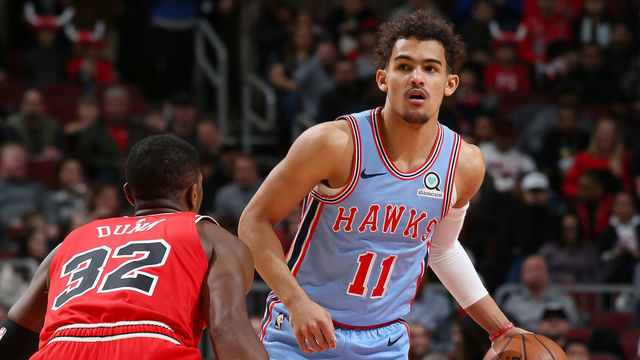 CHICAGO, IL - MARCH 3: Trae Young #11 of the Atlanta Hawks dribbles the ball during the game against Kris Dunn #32 of the Chicago Bulls on March 3, 2019 at the United Center in Chicago, Illinois. Mandatory Copyright Notice: Copyright 2019 NBAE