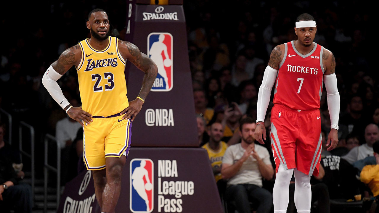 LOS ANGELES, CA - OCTOBER 20: LeBron James #23 of the Los Angeles Lakers and Carmelo Anthony #7 of the Houston Rockets wait for and inbound at Staples Center on October 20, 2018 in Los Angeles, California.