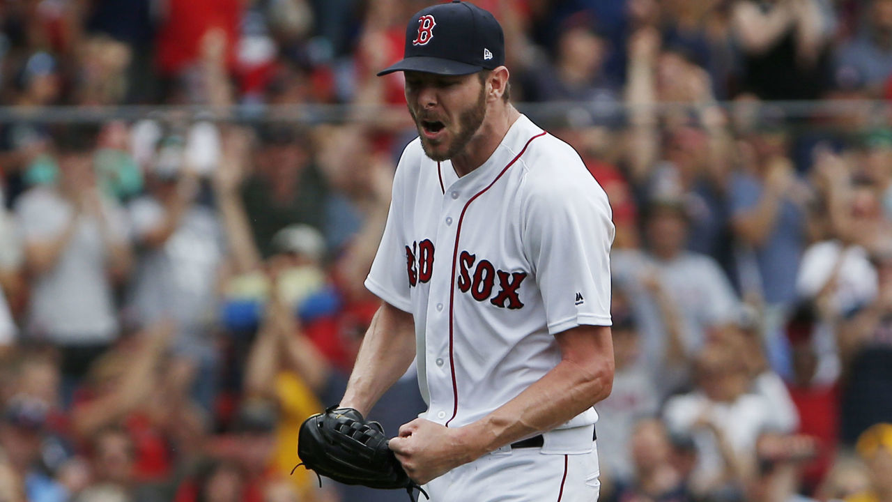 BOSTON - JUNE 24: Boston Red Sox starting pitcher Chris Sale reacts after striking out the Mariners' Mike Zunino during the seventh inning. The Boston Red Sox host the Seattle Mariners in a regular season MLB baseball game at Fenway Park in Boston on June 24, 2018.