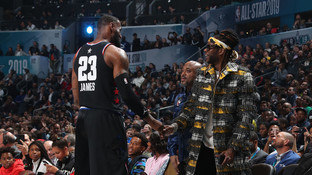 CHARLOTTE, NC - FEBRUARY 17: LeBron James #23 of Team LeBron and Rapper, 2 Chainz shake hands during the 2019 NBA All-Star Game on February 17, 2019 at the Spectrum Center in Charlotte, North Carolina. NOTE TO USER: User expressly acknowledges and agrees that, by downloading and/or using this photograph, user is consenting to the terms and conditions of the Getty Images License Agreement. Mandatory Copyright Notice: Copyright 2019 NBAE