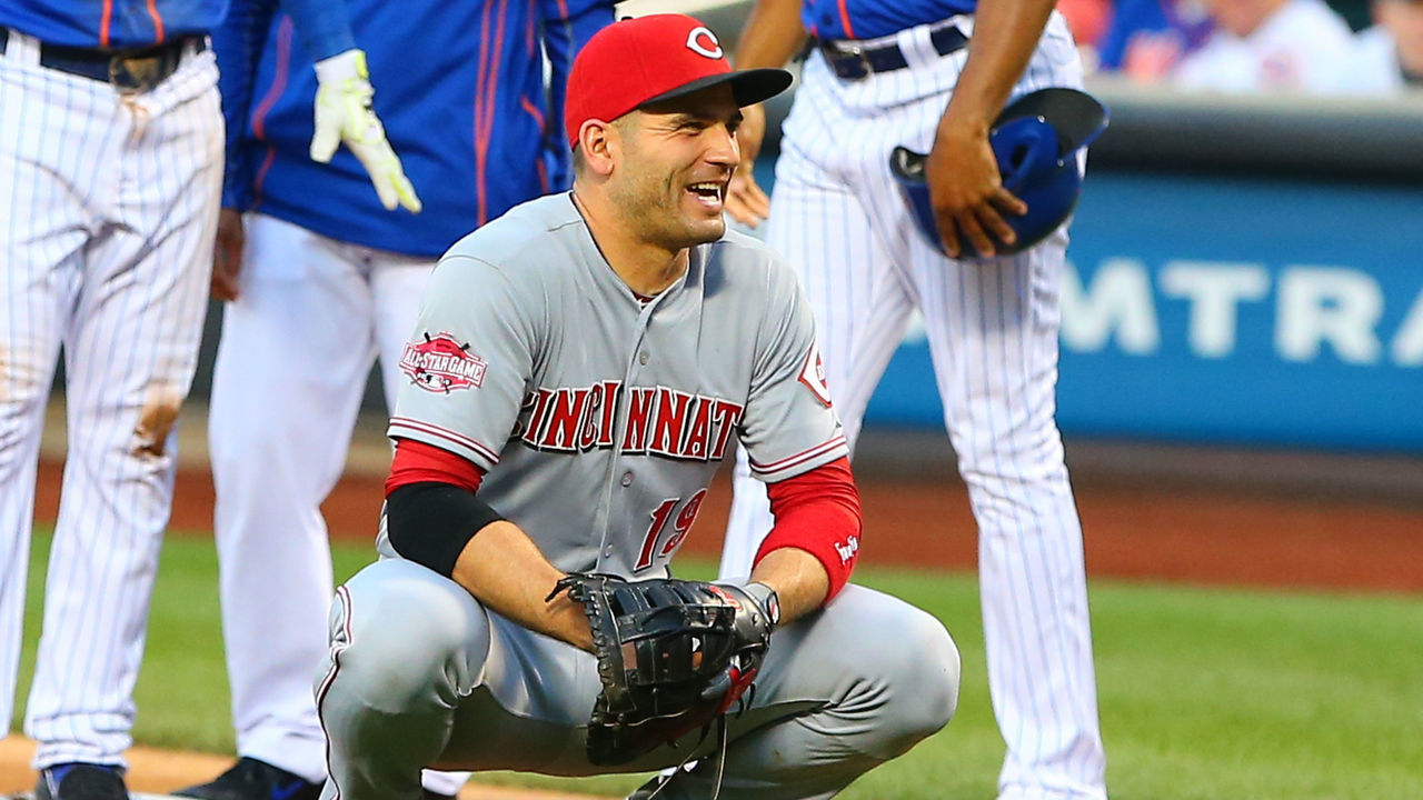 26 JUN 2015: Cincinnati Reds first baseman Joey Votto (19) has a laugh with the New York Mets dugout during the game between the New York Mets and the Cincinnati Reds played at Citi Field in Flushing,NY. The New York Mets defeat the Cincinnati Reds 2-1.