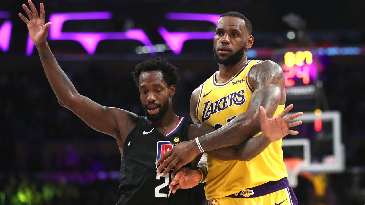 LOS ANGELES, CALIFORNIA - MARCH 04: LeBron James #23 of the Los Angeles Lakers pushes Landry Shamet #20 of the Los Angeles Clippers during the second half of a game at Staples Center on March 04, 2019 in Los Angeles, California. The Los Angeles Clippers defeated the Los Angeles Lakers 113-105.