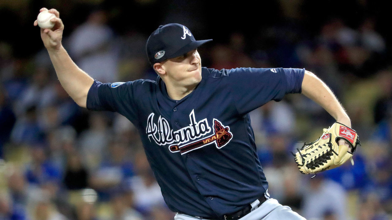 LOS ANGELES, CA - OCTOBER 04: Brad Brach #46 of the Atlanta Braves delivers the pitch against the Los Angeles Dodgers during the seventh inning during Game One of the National League Division Series at Dodger Stadium on October 4, 2018 in Los Angeles, California.