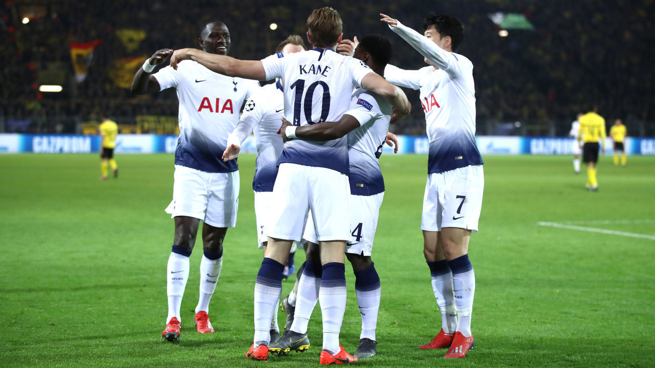 DORTMUND, GERMANY - MARCH 05: Harry Kane of Tottenham Hotspur celebrates with team mates after he scores his sides first goal during the UEFA Champions League Round of 16 Second Leg match between Borussia Dortmund and Tottenham Hotspur at Westfalen Stadium on March 05, 2019 in Dortmund, North Rhine-Westphalia.