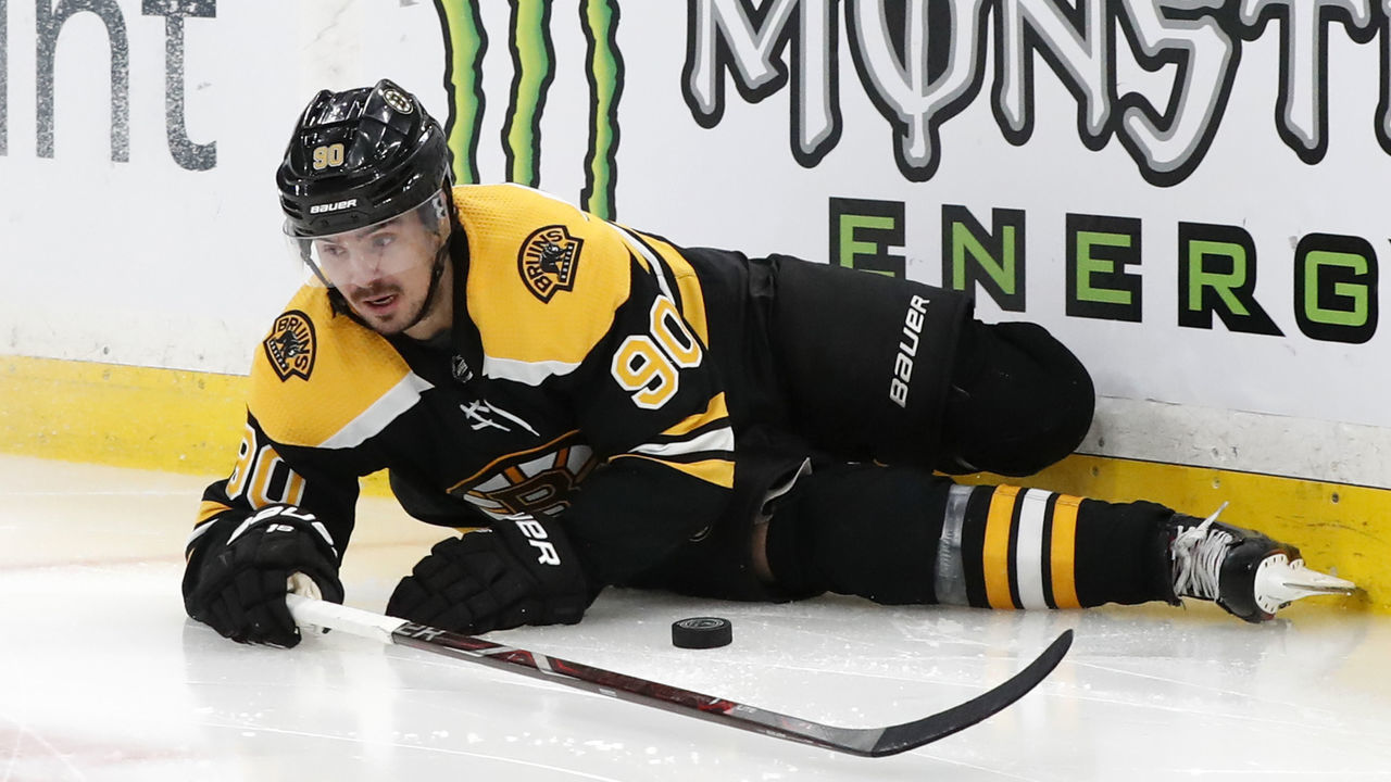 BOSTON, MA - FEBRUARY 28: Boston Bruins left wing Marcus Johansson (90) down after a hit during a game between the Boston Bruins and the Tampa Bay Lightning on February 28, 2019, at TD Garden in Boston, Massachusetts.