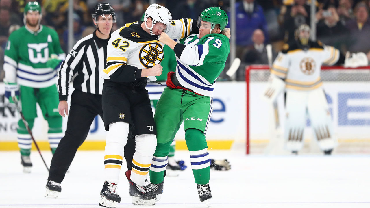 BOSTON, MASSACHUSETTS - MARCH 05: David Backes #42 of the Boston Bruins and Micheal Ferland #79 of the Carolina Hurricanes fight during the first period at TD Garden on March 05, 2019 in Boston, Massachusetts.